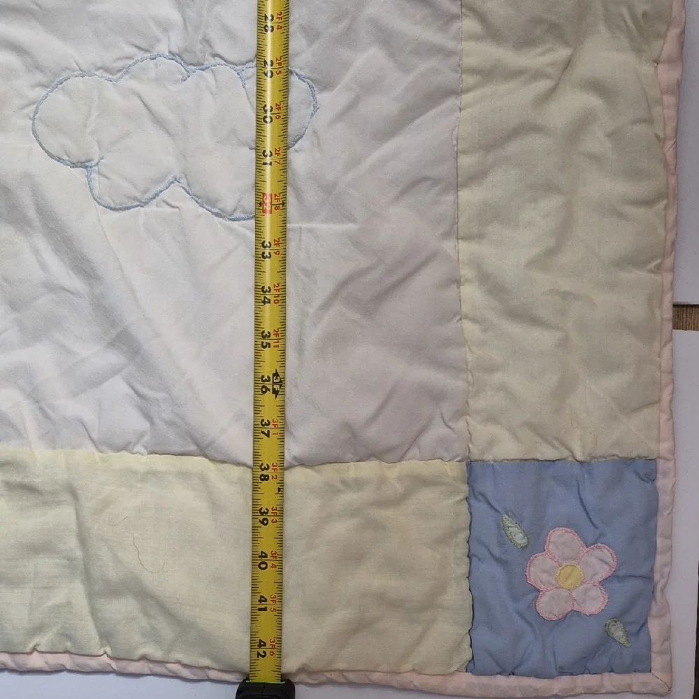 Pastel Embroidered Baby Quilt with Floral Accents